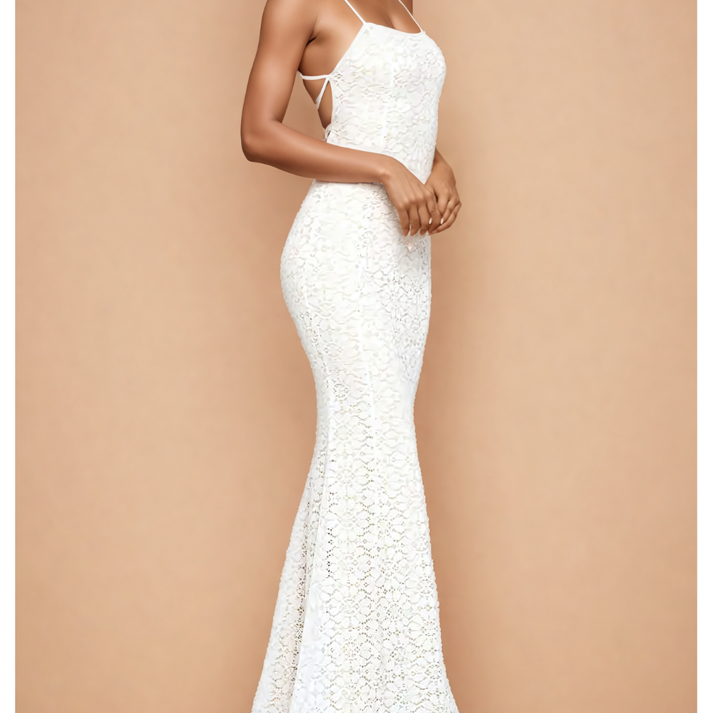 
                      
                        Intricate Lace Mermaid Gown with Open Back Detail
                      
                    